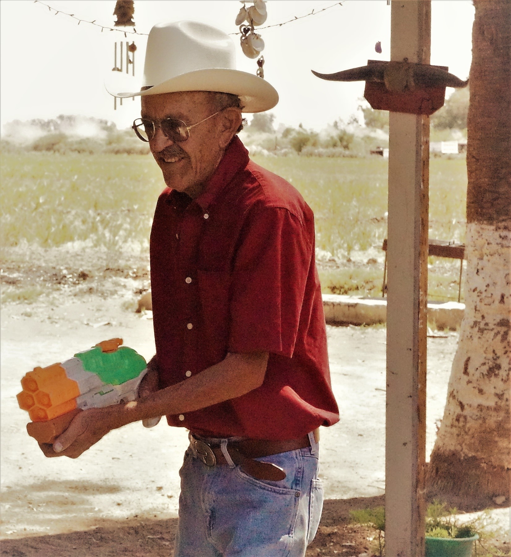 Mexicali Valley Farmer brandishes his squirt gun at an interview with a Netflix Documentary crew.  A violent protest between activists and police at his farm garnered international attention. Protesters attempted to prevent the construction of a pipeline bringing water to the Constellation Brands brewery in January 2018.     